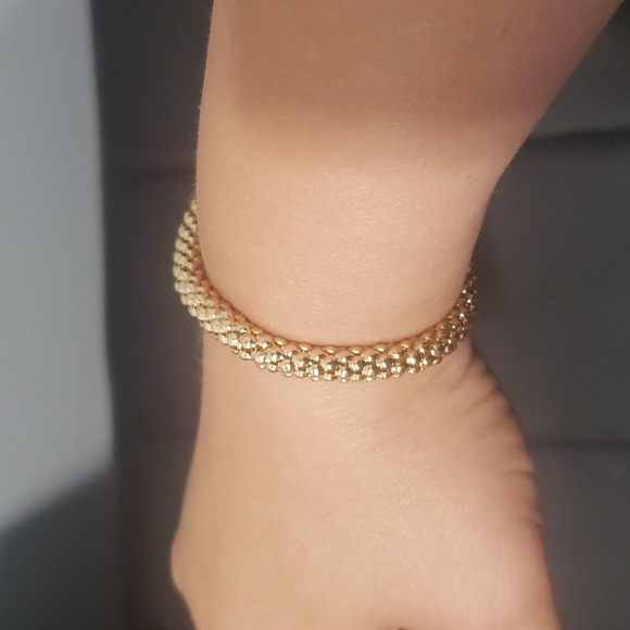Elastic gold colored fashion bracelet - Picture 4 of 5